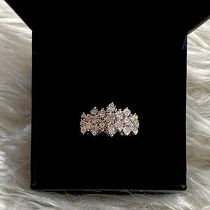 1/2 CT. T.W. Diamond Pyramid Band in 10K White Gold. Brand new never worn.